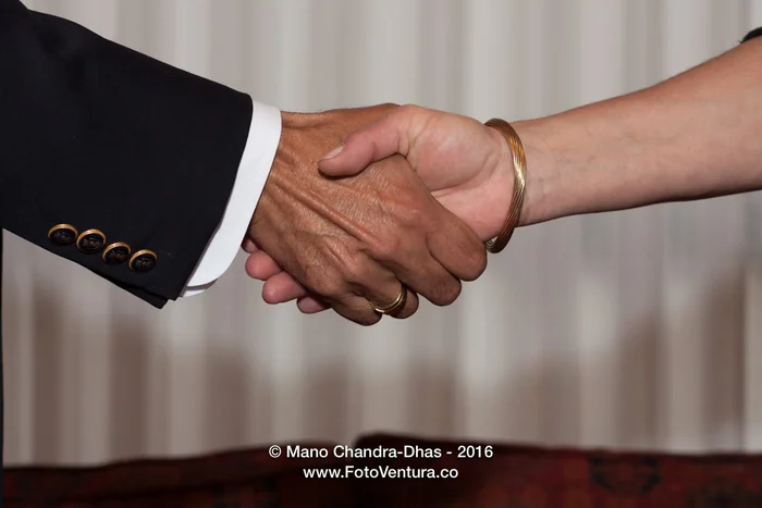 A business handshake between a man and a woman