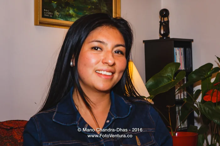 Portrait of a smiling young woman at home