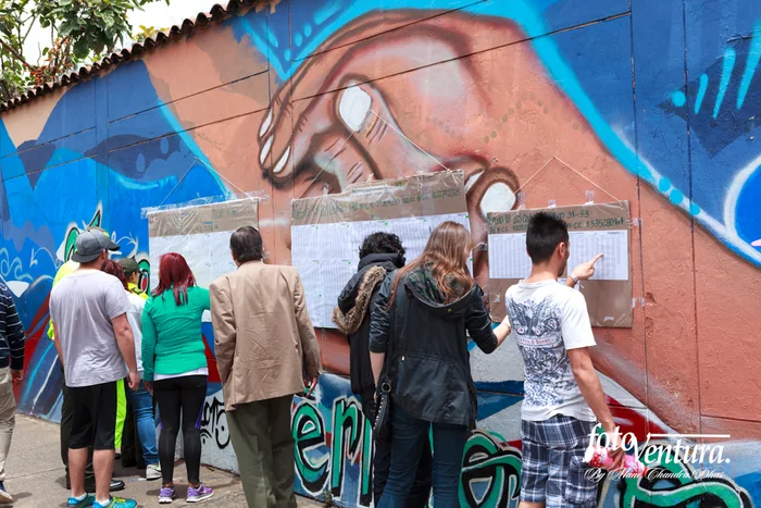 Colombia - The Historic Peace Referendum - Voters Seen Checking Lists Before Proceeding to Allocated Tables to Vote