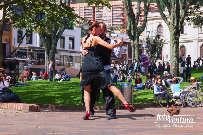 Tango dancers entertain people on the Usaquén Town Square in Bogotá DC Colombia © FotoVentura