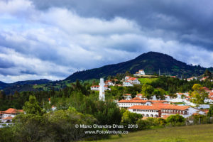 Guatavita, Colombia: Looking over terracota tiled roofs, towards the Andes 1 Guatavita, Colombia: Looking over terracota tiled roofs, towards the Andes