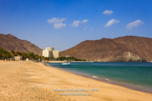 Khor Fakkan, UAE: sandy beach and hotel on Arabian Sea.