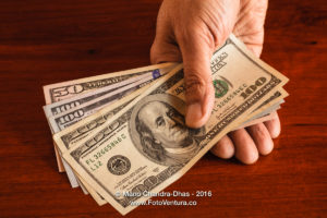 Dollars, USA currency - Not the minimum wage.