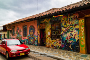 Bogota, Colombia - Traffic Drives Through Historic La Candelaria