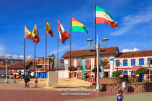 Colombia - Flags and People on Independence Square in Andean Town of Zipaquirá
