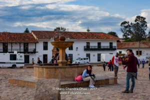 Colombia, South America - People By The Fountain On Main Plaza In 16th Century Villa de Leyva