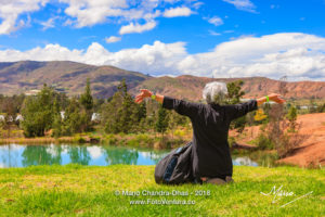 Latin Lady With Silver Hair Celebrates The Beauty Of Nature In the Tranquil Surroundings Of The Pozos Azules Near The Town Of Villa de Leyva On The Andes Mountains In The Colombia Department Of Boyacá
