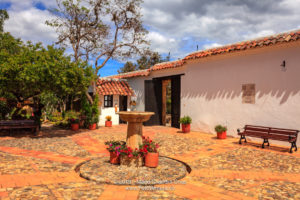 Colombia, South America - The Courtyard Of The House In Which The Colombian National Hero Antonio Ricaurte Was Born, Located In The Historic 16th Century Andean Town Of Villa de Leyva. Image Shot In The Morning Sunlight