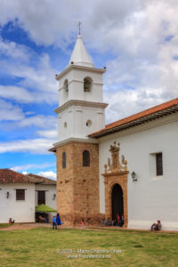 Colombia, South America - The Bell Tower And Steeple Of The Church, Iglesia del Carmen, Of The Carmelite Convent, In The 16th Century Town Of Villa de Leyva, In The Boyacá Department