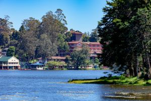 Kodaikanal, South India - Looking Across Kodaikanal Lake Towards The Boathouse And Carlton Hotel,In The Colonial Town In The State Of Tamil Nadu 1 Kodaikanal, South India - Looking Across Kodaikanal Lake Towards The Boathouse And Carlton Hotel,In The Colonial Town In The State Of Tamil Nadu