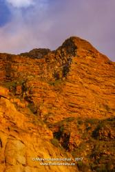 Hout Bay, South Africa: setting sun turns mountain to gold © Mano Chandra Dhas