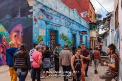 Bogotá, Colombia - Tourists and Local Colombian People on the Narrow Calle del Embudo