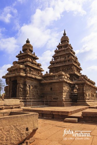 Mahabalipuram, India - Gopuram Of The Pallava 8th Century Shore Temple Against A Blue Sky
