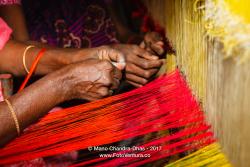 Kanchipuram, Tamil Nadu, India - Hands of Women Loading Silk Thread Into a Handloom